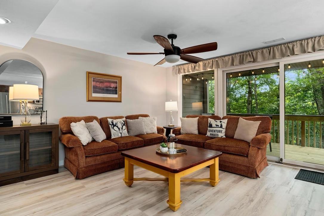 Three Ridges 405 bright living room with deck views and forest